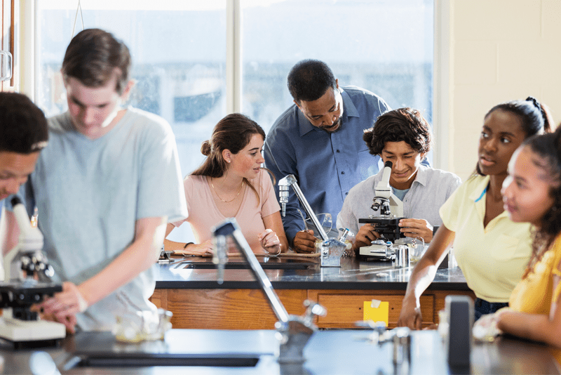 High school students in a classroom doing inquiry-based science